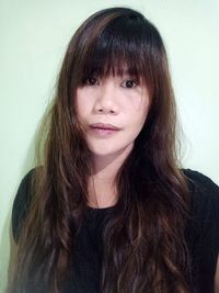 Close-up portrait of a smiling young woman