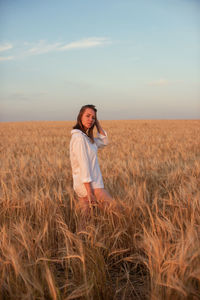 Seductive woman standing infield