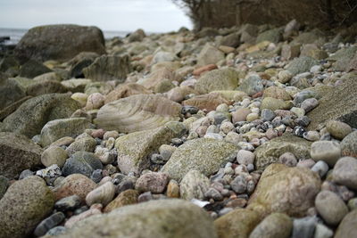 Close-up of stones on beach