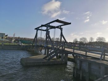 Pier over sea against sky