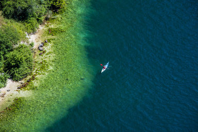 High angle view of people on sea shore