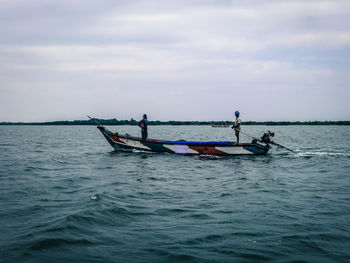 Boat sailing in sea