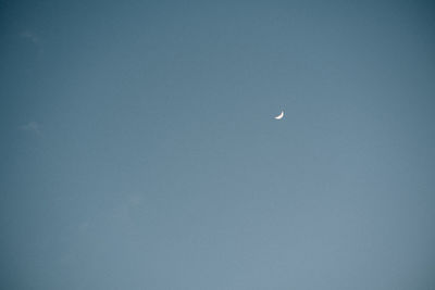 Low angle view of moon in sky