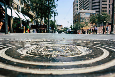 Surface level of road by buildings in city