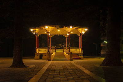 Illuminated street lights at night