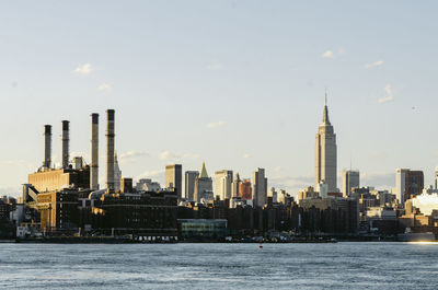 Modern buildings in city against sky