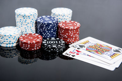 Close-up of objects on table against black background