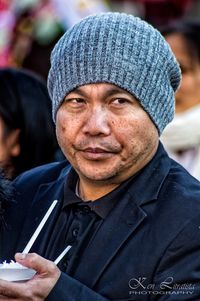 Portrait of man wearing hat