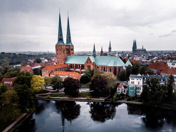 Panoramic view of buildings against sky in city from aerial view in lübeck, germany 