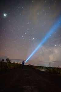 Scenic view of field against sky at night