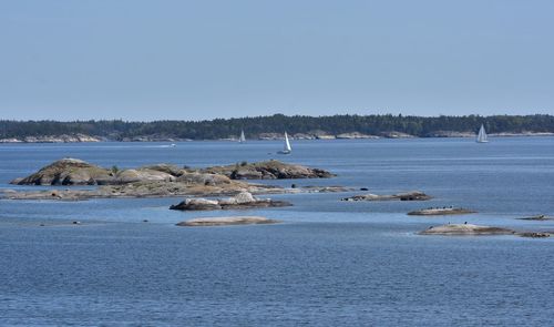 Scenic view of sea against clear sky