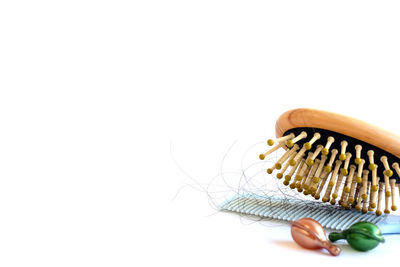 Close-up of woman hand over white background