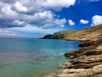 Scenic view of sea against cloudy sky