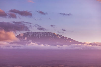 Scenic view of mountains against sky during sunset