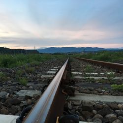 Railroad tracks on landscape