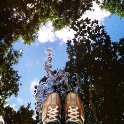 Low angle view of trees against sky
