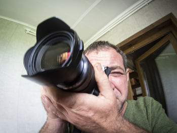 Portrait of man photographing