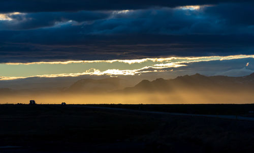 Scenic view of silhouette landscape against sky during sunset