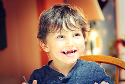 Close-up portrait of boy smiling