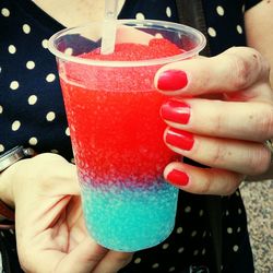 Cropped hand holding ice cream