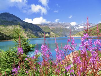 Scenic view of lake against cloudy sky