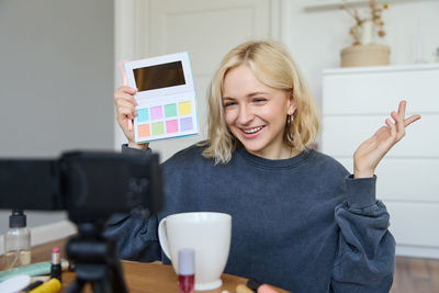 Young woman using mobile phone