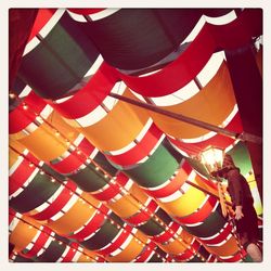 Low angle view of multi colored umbrellas