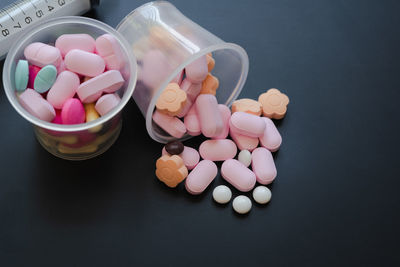 High angle view of multi colored candies on table