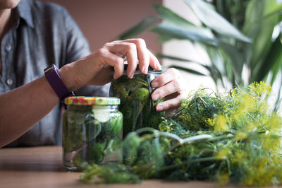 Midsection of woman preparing food