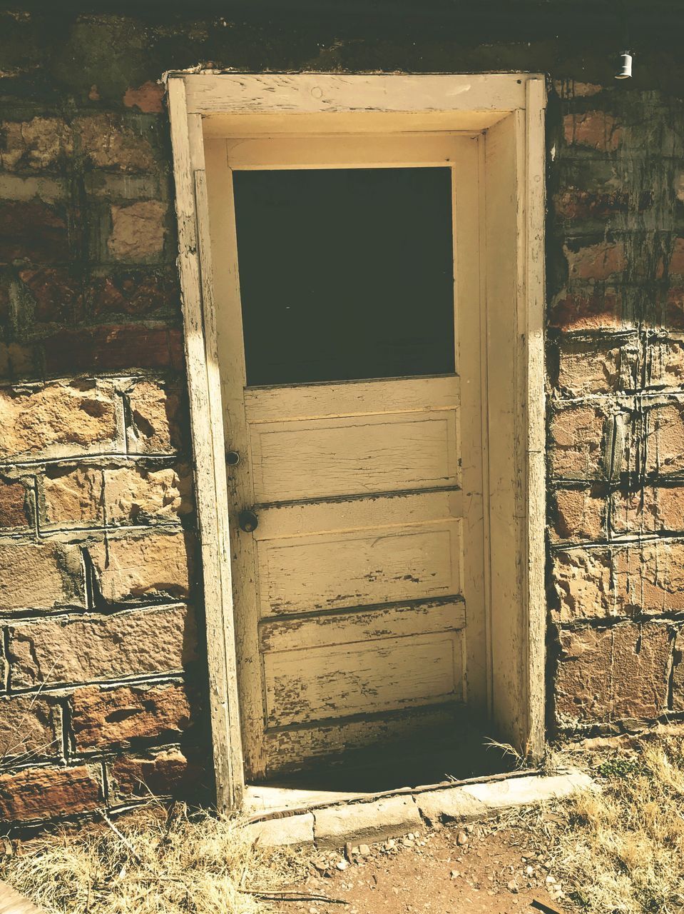 ENTRANCE OF OLD ABANDONED HOUSE