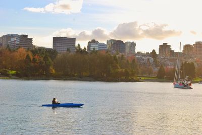 Man canoeing in river