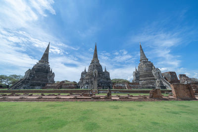 View of temple against cloudy sky