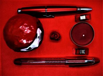 High angle view of red wine on table