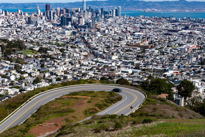 High angle view of street amidst buildings in city