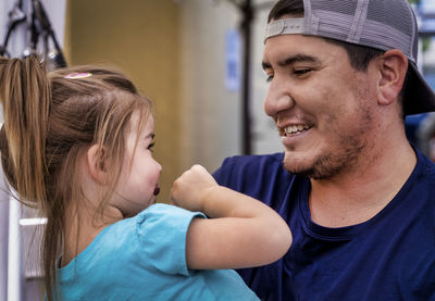 Close-up of happy father and daughter