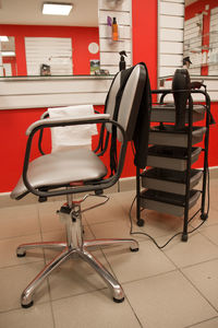 Interior of a barbershop with client's armchairs.