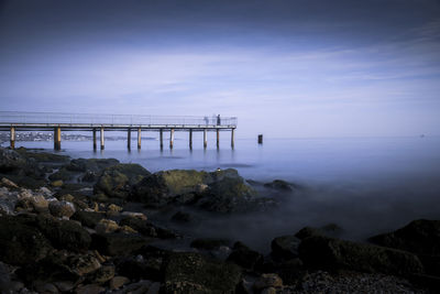 Scenic view of bay against sky