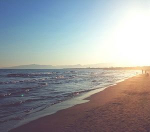 View of beach against clear sky