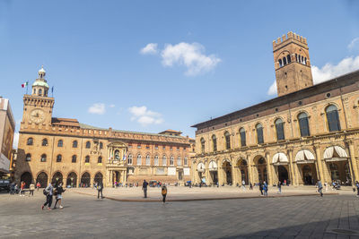 Group of people in front of historical building