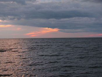 Scenic view of sea against dramatic sky