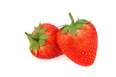 Close-up of strawberries against white background