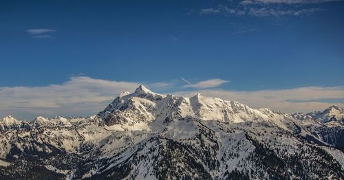 Scenic view of mountains against sky during winter