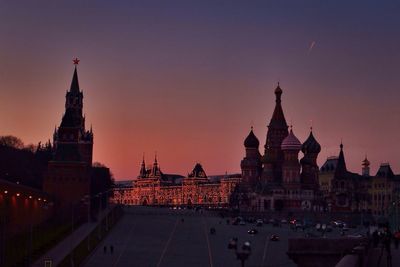 Low angle view of church against sky at sunset