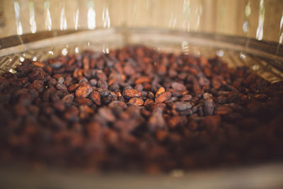 Close-up of cocoa beans on table
