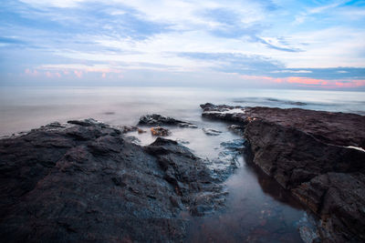 Scenic view of sea against sky during sunset