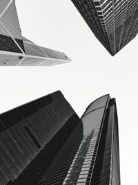 Low angle view of modern buildings against sky