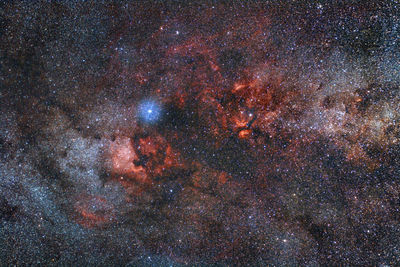 Firework display in sky at night