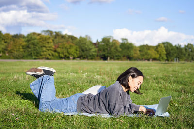 Portrait of woman using mobile phone