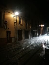 Illuminated street light at night