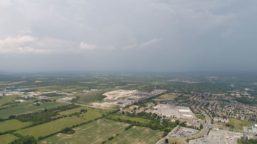 High angle view of buildings in city against sky